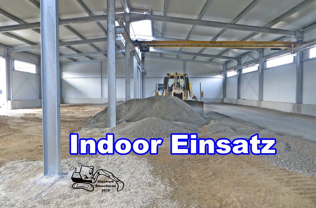 Raupe und LKW im Indoor-Einsatz