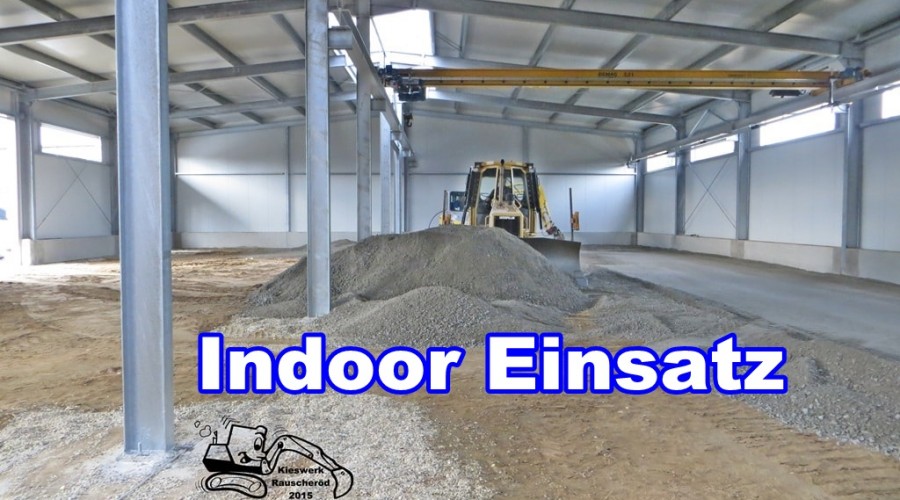 Raupe und LKW im Indoor-Einsatz